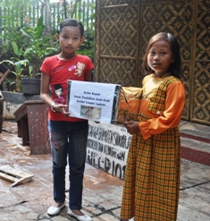 Buka Puasa, LSM dari Jakarta Beri Koin Peduli Korban Lumpur Lapindo